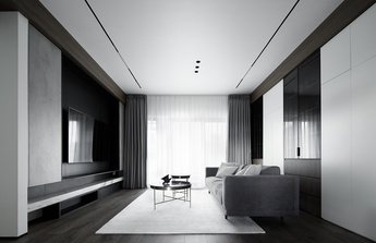 #人人都是美好创享家# 简约轻松的灰色布艺沙发，黑色的吊灯，使简洁的空间顿时充满艺术感。